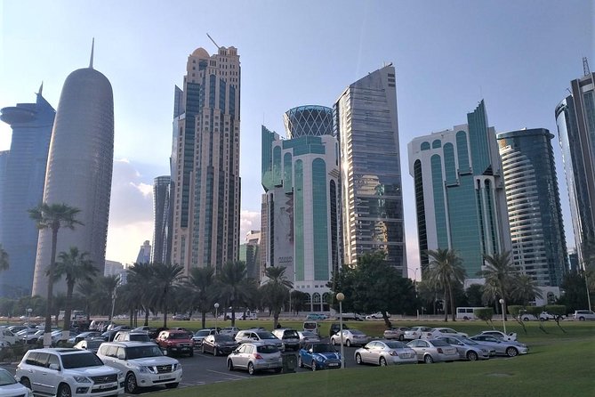 Doha City Tour: Souq Waqif, Katara, The Pearl, and Corniche - The Pearl Island shows modern Doha
