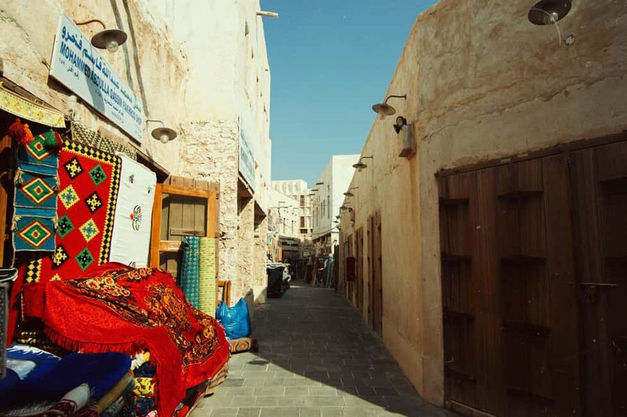 Doha: Souq Waqif, Dhow Harbour, and Street Food Walking Tour - Tea and street snacks at an outdoor café