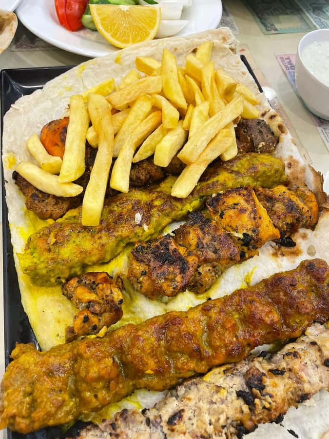 Dubai Food Tour: 4 Cuisines, Souks & Street Bites - Al Khayma serves Emirati food in a heritage setting