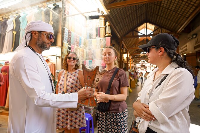 Dubai: Old Town, Souks, Street Food, Guided Tour & Abra Ride - Walking Al Fahidi’s narrow lanes