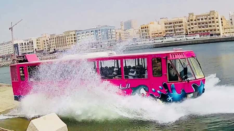 Dubai: Old town tour with Wonder Bus, souks, Creek and Guide - The big moment: entering Dubai Creek