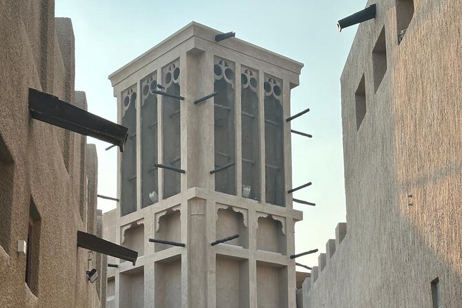 Dubai Old Town Walking Tour with Abra ride, Spice and Gold Souk - Al Fahidi Fort and the story of old power