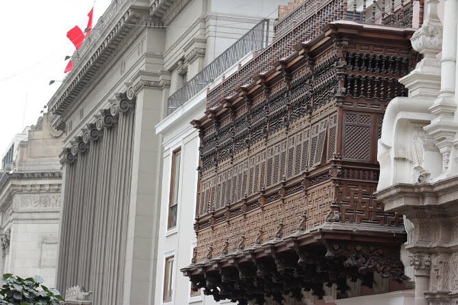 Experience Lima: Taste 12 Snacks and Visit Top Monuments - Pan con chicharrón gives you a proper sandwich break