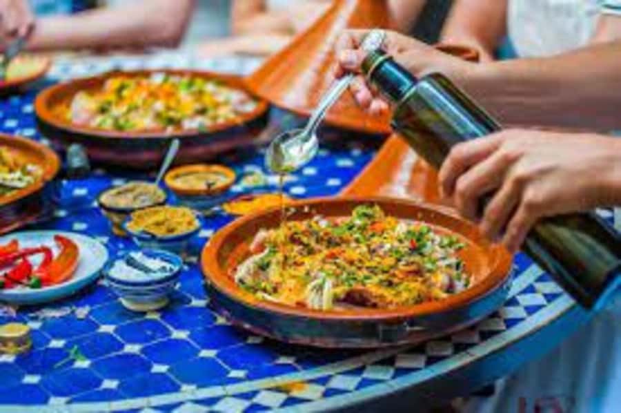 Flavors of Fez: Market visit, and a hands-on cooking class. - Starting at the Blue Gate in Fez