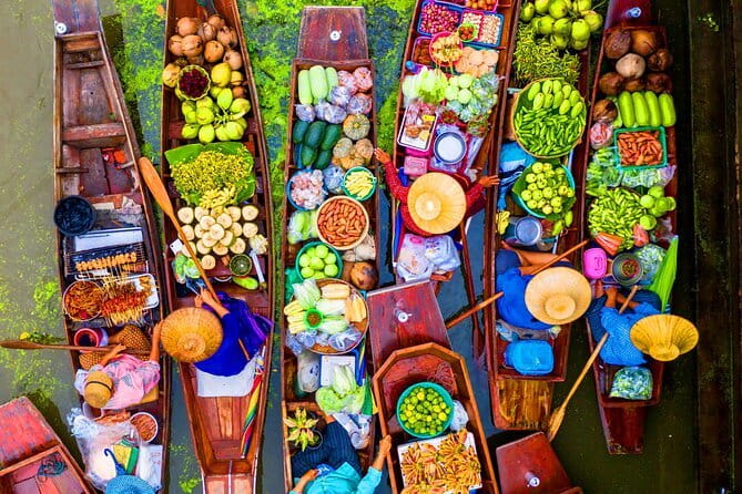 Floating and Railway Markets Private Tour - Taking a motorboat through Damnoen Saduak