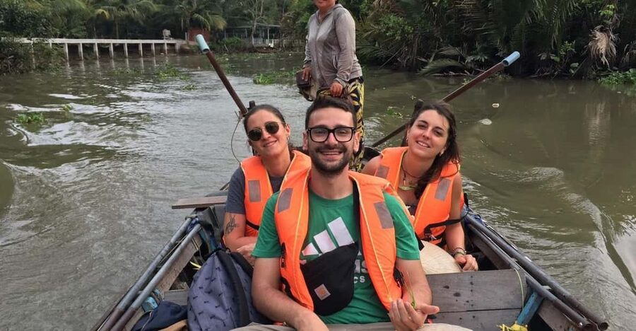 floating market boat trip everyday - The wooden boat ride is part of the experience