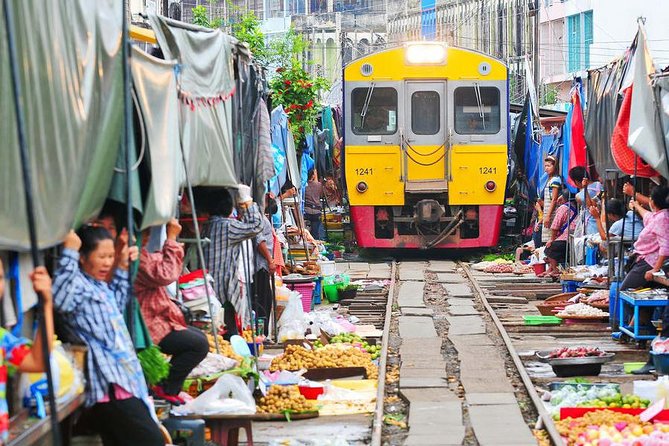 Floating Market & Railway Market Bangkok - Maeklong Railway Market and the moving tracks
