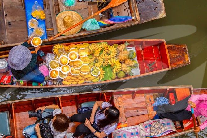 Floating Markets and Bridge on River Kwai Tour from Bangkok - Coconut sugar, candy, and the first sales stop