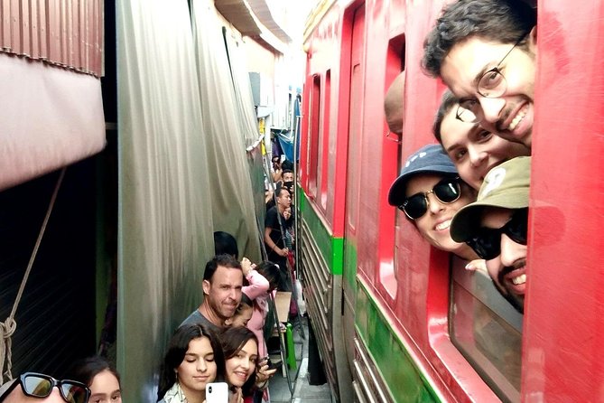 Floating & Railway Market and Coconut Farm Tour [Optional Luxury] - Mae Klong Railway Market: the train that owns the street