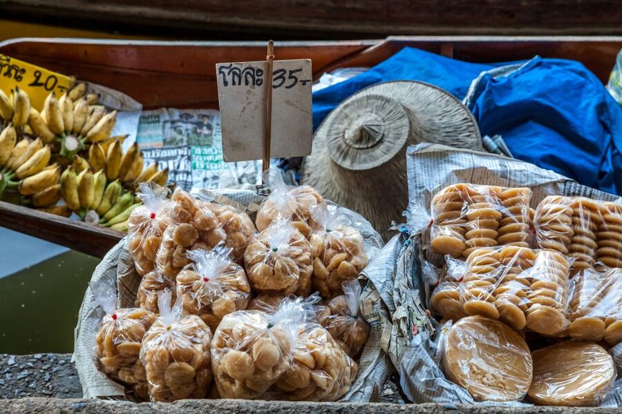 From Bangkok: Damnoen Saduak Floating Market Guided Tour - The palm sugar stop adds real context