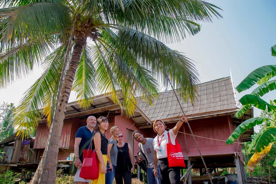 From Bangkok: Private Railway and Floating Market Tour - Through the canals by small boat