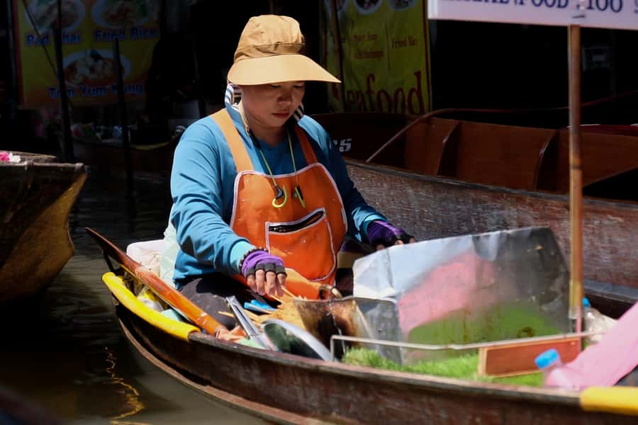 From Bangkok: Private Railway and Floating Market Tour - The railway market and the train that cuts through it