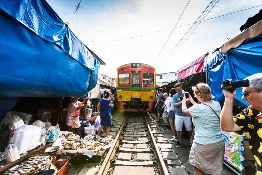 From BANGKOK: Railway Market and Amphawa Floating market - Amphawa at midday: food, canals, and market stalls