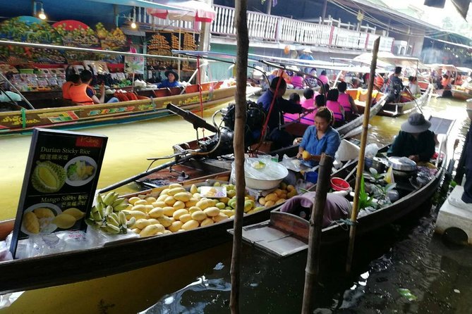 Full-Day Floating Market and Maeklong Railway Market Private Tour from Bangkok - Maeklong Railway Market and the train that cuts through it