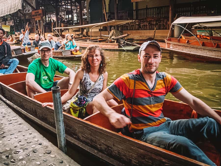 Grand Palace, Damnoen Floating Market & Maeklong Market Tour - Maeklong Railway Market and the famous umbrella routine