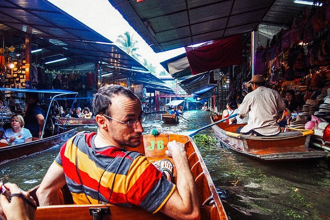 Grand Palace, Damnoen Floating Market & Maeklong Railway Market Tour – Full Day - Damnoen Saduak and the included boat ride