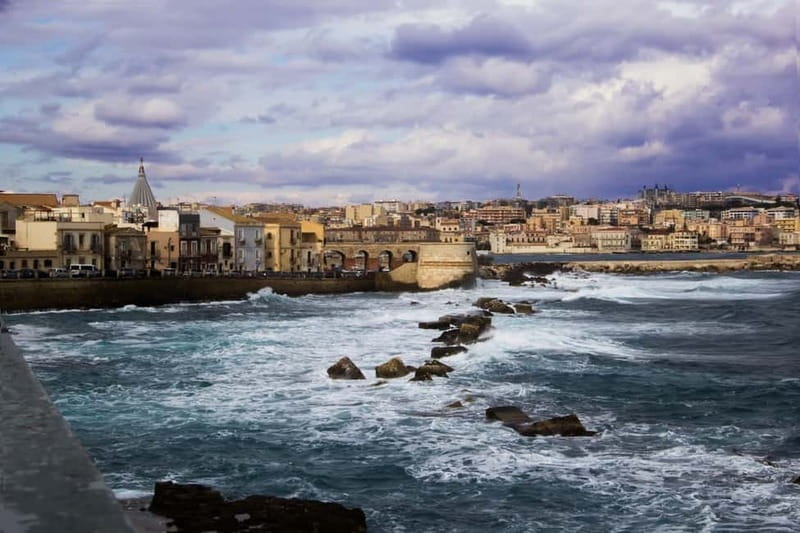 Guided tour of Ortigia with Fish Street Food at the market - Ending at the Ortigia fish market
