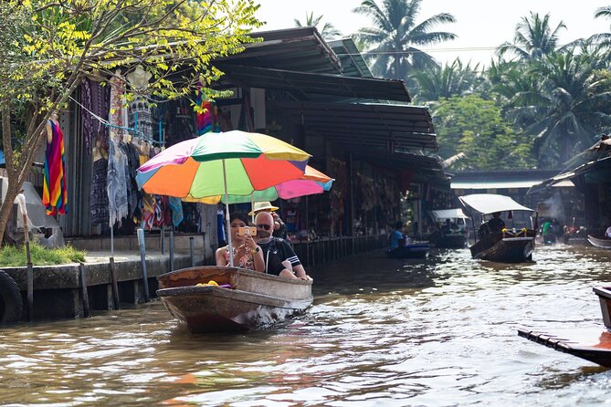 Half Day Railway Market and Damnoen saduak Floating Market tour - Watching Maeklong Railway Market fold away