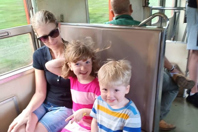 Half-Day Railway Market and Floating Market Tour in Thailand - Riding the train into Maeklong Railway Market
