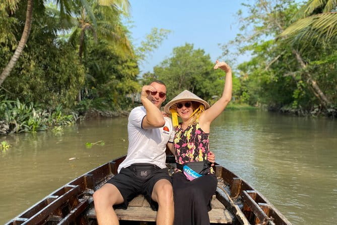 Hau River Floating Market and Con Son Islet Adventure - Making cakes and popping rice