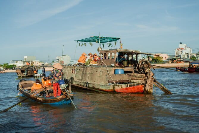 Hau River Floating Market and Con Son Islet Adventure - Cai Rang Floating Market by wooden boat