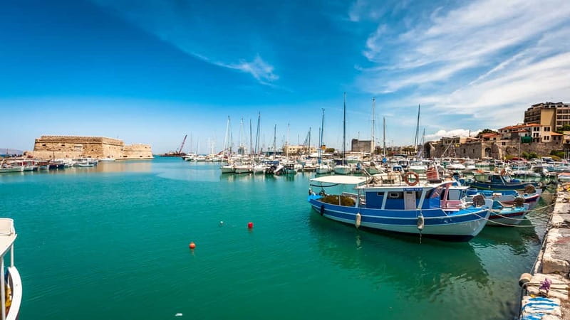 Heraklion: Heraklion Market & CretAquarium <em>SKIP The Line – Key points to know before booking’ /></p>
<ul>
<li><strong>Cretaquarium comes first:</strong> You get about 80 to 90 minutes for sharks, sea turtles, jellyfish, tuna, clams, and other Mediterranean species.</li>
<li><strong>The aquarium ticket costs extra:</strong> Pay €12 for an adult or €6 for a child aged 5 to 17. Tickets are arranged on the bus, with skip-the-line access.</li>
<li><strong>Heraklion time is split between market and city center:</strong> You may spend about 1.5 hours at the open market, then roughly two hours in central Heraklion.</li>
<li><strong>The city tour is not always a continuous guided walk:</strong> You see Liberty Square, Morosini Fountain, Koules Fortress, and the Venetian Walls, then have free time to explore.</li>
<li><strong>Pickup covers many resort areas:</strong> Service is offered around Malia, Stalis, Hersonissos, Analipsi, Anissaras, Gouves, Gournes, Kokkini Chani, Heraklion, Ammoudara, and other listed points. Confirm your exact meeting place.</li>
<li><strong>This suits families and first-time visitors:</strong> It is a good choice if you want transport, a short aquarium visit, and a quick introduction to Heraklion in one day.</li>
</ul>
<h2>What this six-hour Crete trip is really designed to do</h2>
<p><img width="800" height="450" decoding="async" src=