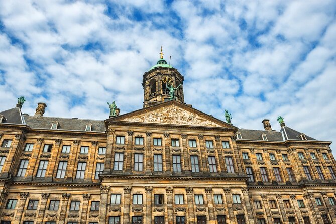 Historic Amsterdam Walking Tour: Royal Palace & Flea Markets - Finishing at Dam Square