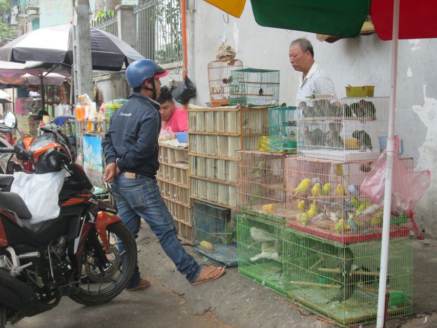 Ho Chi Minh City: Saigon Morning Markets Tour by Motorbike - Flowers, lanterns, and color in the morning