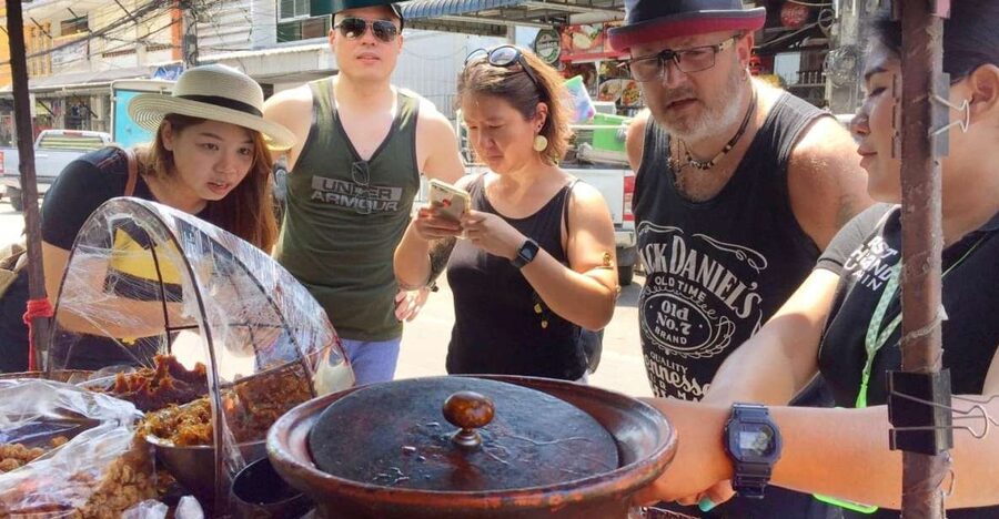 Hua Hin: Thai Street Food & Market Walking Tour - Starting with Jok Muu, coffee, and Thai doughnuts