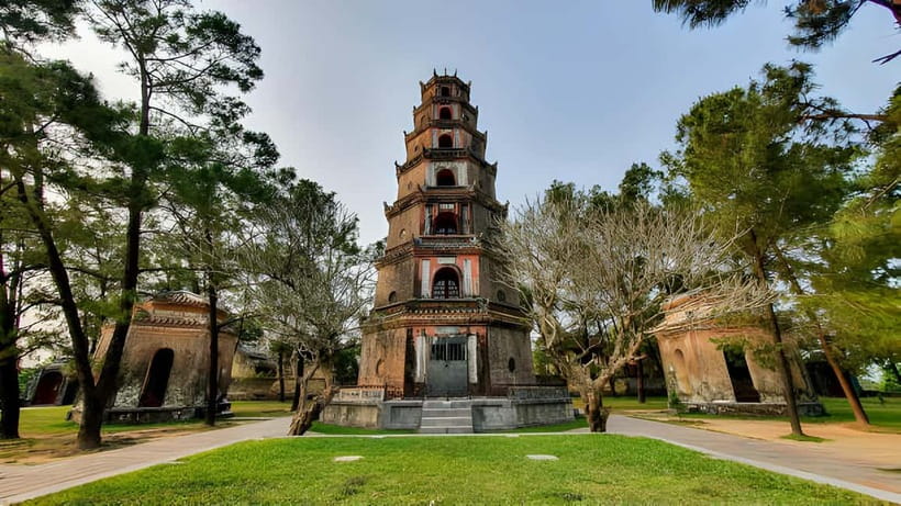 Hue: Dragon Boat Cruise, Imperial Citadel, & Market Day Trip - Gliding along the Perfume River by dragon boat
