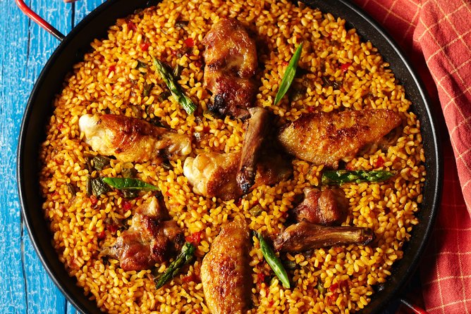 Interactive Paella & Market: Bottomless Wine & Rambla Views - Shopping at La Boqueria with a chef