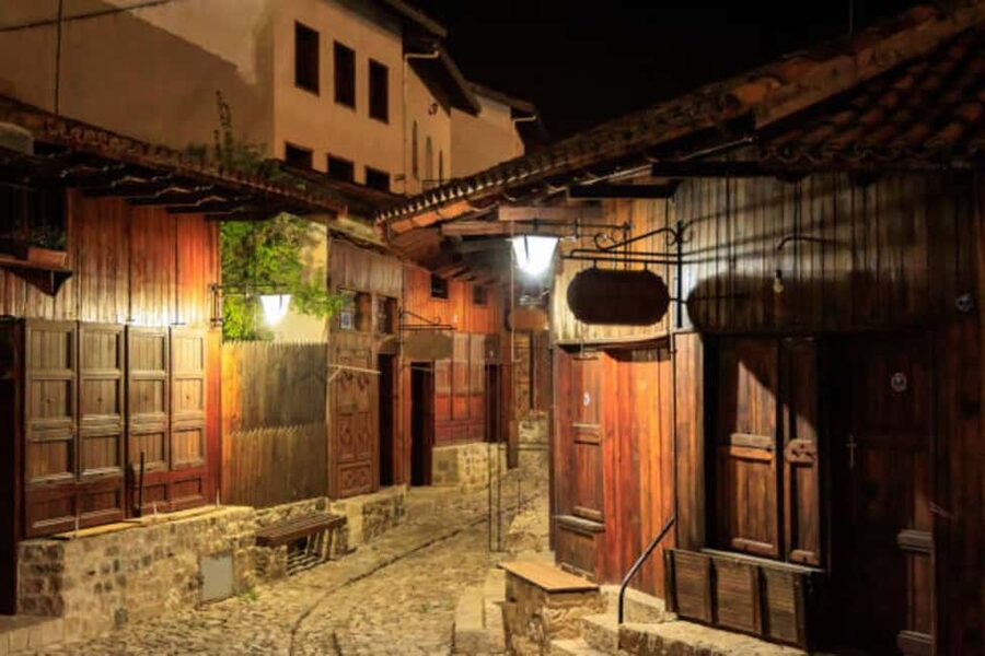 Kruja by Night: Castle & Bazaar Tour from Tirana - Walking the illuminated Old Bazaar