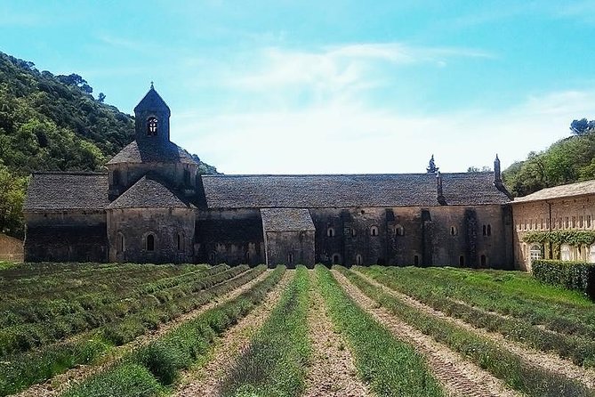 Luberon Market & Villages Day Trip from Aix-en-Provence - Roussillon brings red ochre into the day
