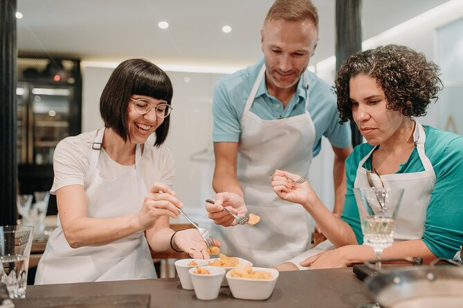 Madrid Tapas & Paella Cooking Experience with Local Market Visit - Key points at a glance