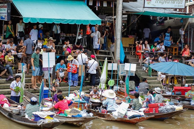 Maeklong & Damnoen Saduak Markets: Railway & Floating Market Tour - Guides, group size, and the value of the price