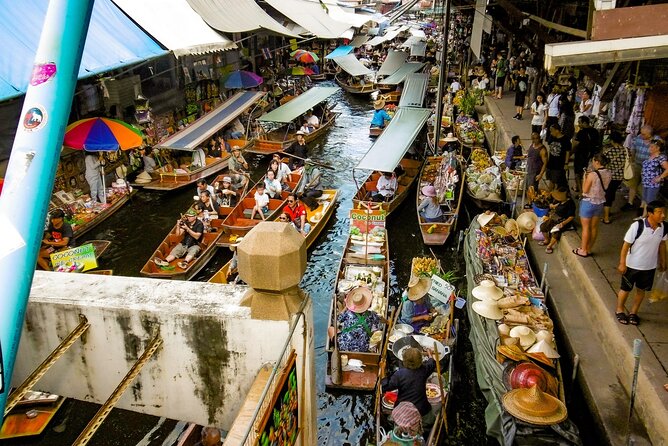 Maeklong Railway, Sugar Palm Factory & Floating Market - Maeklong Railway Market and the train that splits the stalls