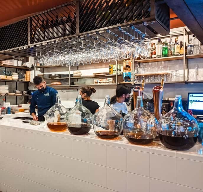 Marbella: Guided Market Tour with Tapas and Wine Pairings - Cured ham, cheese, and the famous bocata