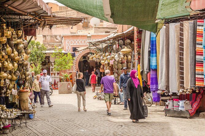 Marrakech: Bahia Palace, Saadian Tombs, Souk and Medina Tour - Souks, artisan workshops, and shopping pressure