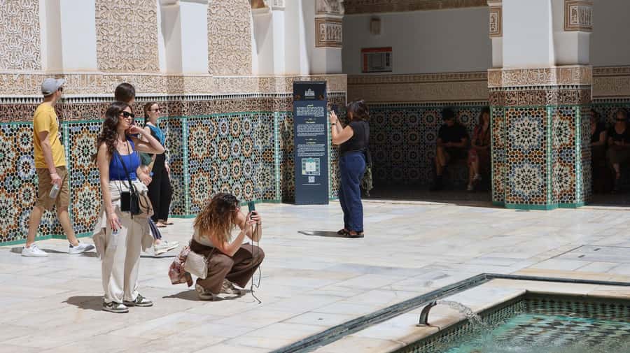 Marrakech: Ben Youssef Medersa, Le Jardin Secret & Souk Tour - Through Medina lanes and the working souks