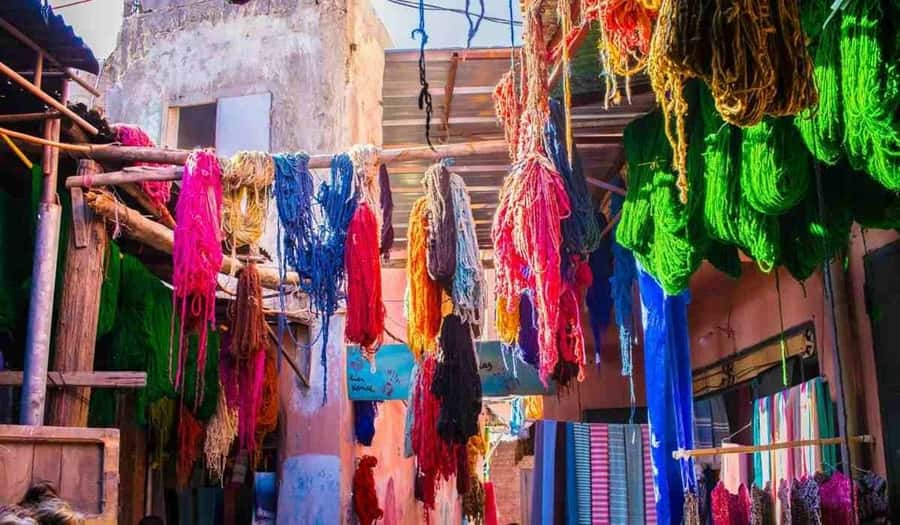 Marrakech: Medina and Souks Walking Tour - Shopping for leather, ceramics, lanterns, and caftans