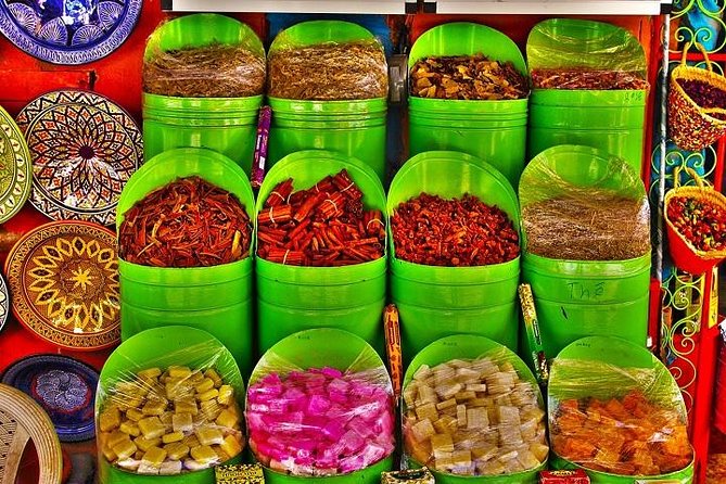 Marrakech: Medina Souks Guided Walking Tour - Medina courtyards, fountains, baths, and everyday life