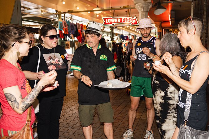 Meet the Market- Food and Fun tour in Pike Place Market - DeLaurenti’s pizza and the busy center of Pike Place