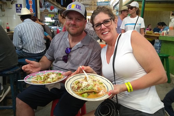 Mercado walking food tour - Churches, old buildings, and the former bullfight ring