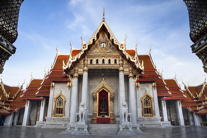 Morning Buddhist Almsgiving, Grand Palace and Flower Market Tour in Bangkok - 6:30 a.m. pickup and the first ride