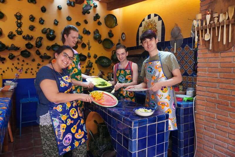 Oaxaca: Traditional Oaxacan Cooking Class with Market Visit - Cooking inside a local family home