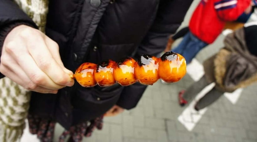 Osaka: Food Tour Kuromon Market & Dotonbori with Guide - An egg tart for the sweet finish
