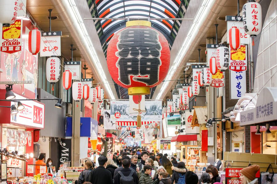 Osaka: Kuromon Market 1.5-Hour Seafood & Street Food Tour - The first walk through Kuromon Ichiba Market