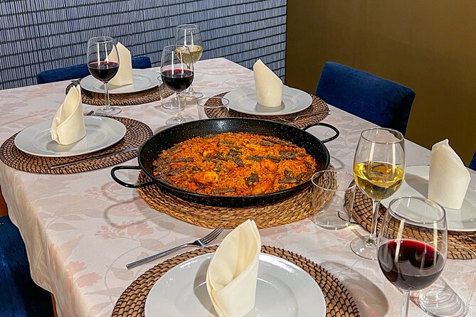 Paella Cooking Class, Wine Tasting & Central Market in Valencia - Tapas, wine, and the meal afterward