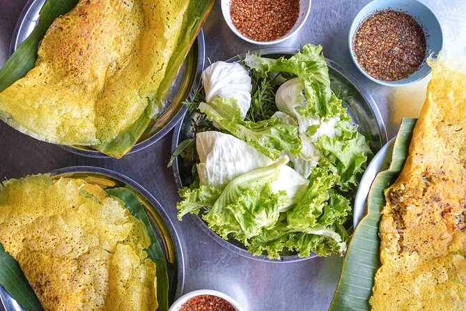 Phnom Penh Morning Market & Food Tour by Tuktuk - Includes All Food & Drinks! - Stop three: pork, rice, and homemade pickles