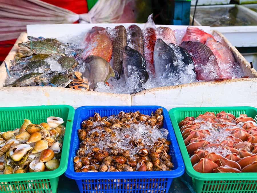 Phuket: Sunset View and Seafood Market Dinner Guided Tour - Rawai Market puts seafood in your hands